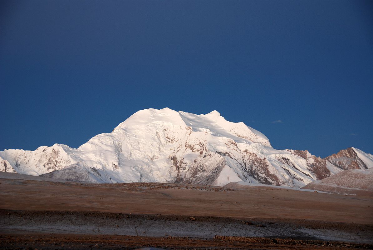 04 Gang Benchen From Shishapangma North Base Camp Just Before Sunrise The large mountain to the north west of Shishapangma is Gang Benchen with heights variously given as 7281m, 7295m or 7299m, taken from Shishapangma North Chinese Base Camp (5029m) just before sunrise.